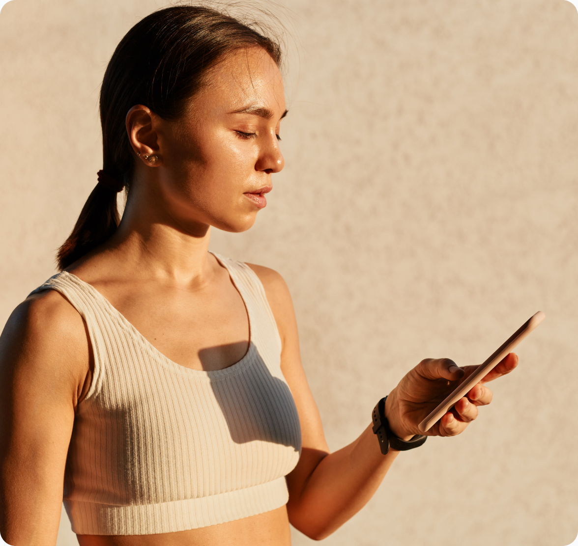 Person checking the nordicalab app on their phone outdoors